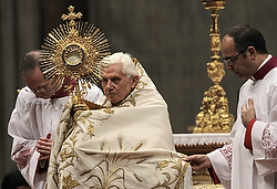 POPE BENEDICT HOLDS MONSTRANCE DURING VESPERS SERVICE AT ST. PETER'S BASILICA