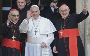 Newly elected Pope Francis waves after praying at basilica in Rome