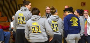 Lauren Hill, center, speaks with teammates before a check presentation at Mount St. Joseph University earlier this year. (CT Photo/John Stegeman)