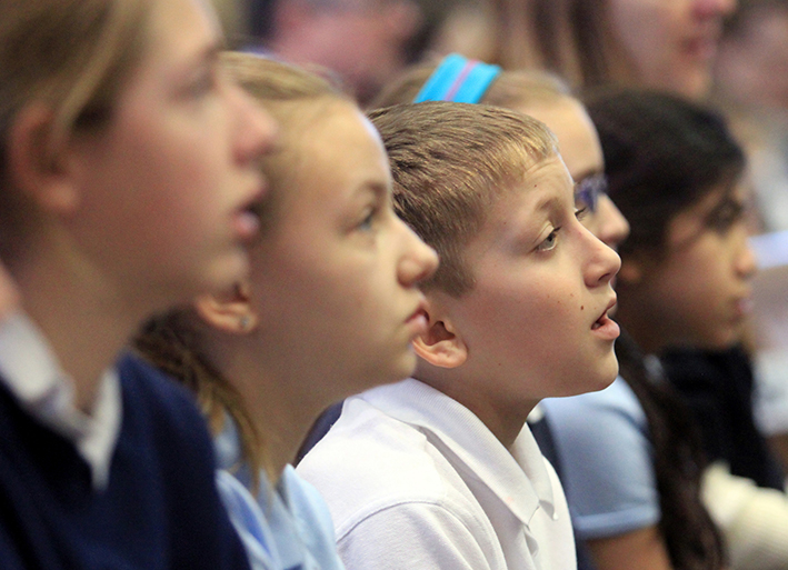 Students sing during the Catholic Schools Mass at Our Lady of the Immaculate Conception Church in Dayton Wednesday, Jan. 28, 2015. (CT Photo/E.L. Hubbard)