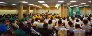 Players from several schools in the northern parts of the archdiocese pray the rosary at a SportsLeader Rosary Rally in Dayton July 28. (Courtesy Photo/SportsLeader)