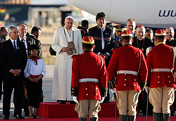 Pope Francis reviews an honor guard with Bolivian President Evo Morales at El Alto International Airport in La Paz, Bolivia, July 8. (CNS photo/Paul Haring)