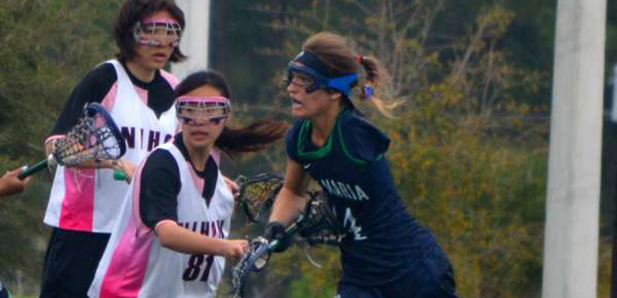 Valeria Tkacik playing lacrosse for Ave Maria University. (Photo courtesy of Sports Up Today)