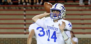 St. Xavier quarterback Sean Clifford looks for a target during a game against Moeller at Nippert Stadium. The Bombers are one of six area Catholic schools still alive this postseason. (CT Photo/E.L. Hubbard)