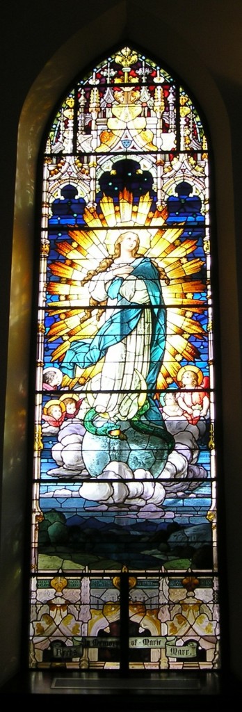 One of the historic windows at St. Julie Billiart parish in Hamilton The Immaculate Conception is depicted here. (Courtesy Photo)