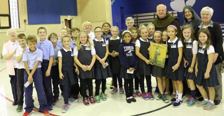 Students at Our Lady of Lourdes enjoyed visiting with priests and religious from various backgrounds as part of Vocations Day. (Courtesy Photo)