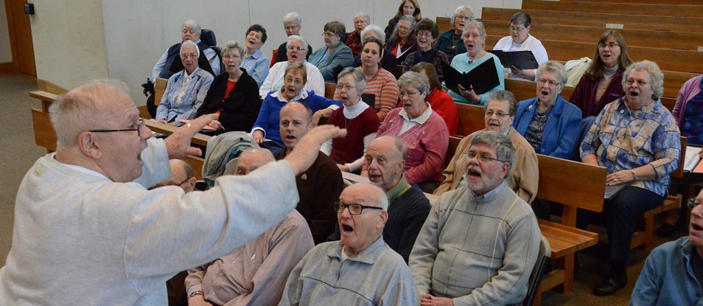 Franciscan Father Fred Link directs women and men religious during a rehearsal for “Wake up the World: A Concert Celebrating the Year of Consecrated Life,” scheduled for Jan. 17, 3 p.m. at the Cathedral of St. Peter in Chains. (Courtesy Photo)