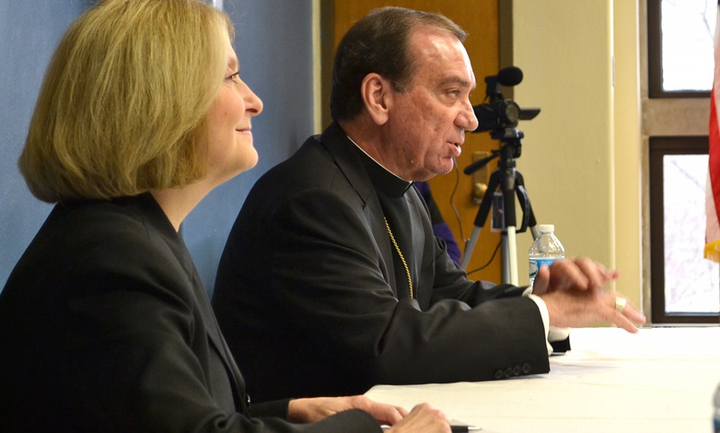 Archbishop of Cincinnati Dennis M. Schnurr, right, answered questions from high school students around the Archdiocese of Cincinnati on Monday via teleconference as part of Catholic Schools Week. This year Lehman Catholic High School in Sidney was host to the broadcast. (CT Photo/John Stegeman)