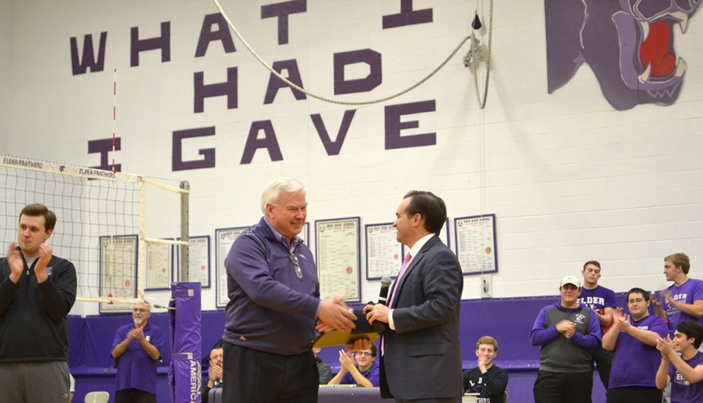 Elder High School Principal Tom Otten shakes hands with Mayor of Cincinnati John Cranley on Feb. 5, 2016 after Cranley proclaimed the date "Tom Otten Day" in the City of Cincinnati. (CT Photo/John Stegeman)