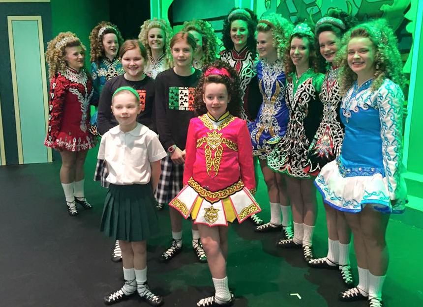 A group from the Erickson Academy of Irish Dance smiles for a photo before performing at Summit Country Day school on March 17, St. Patrick's Day. (Courtesy Photo)