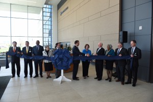Various dignitaries, including Cincinnati Mayor John Cranley, participated in a ribbon cutting ceremony at Mercy Health's new home office. (Courtesy Photo)