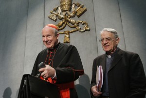 Austrian Cardinal Christoph Schonborn and Jesuit Father Federico Lombardi, papal spokesman, arrive for a news conference for the release of Pope Francis' apostolic exhortation on the family, "Amoris Laetitia" ("The Joy of Love"), at the Vatican April 8. The exhortation is the concluding document of the 2014 and 2015 synods of bishops on the family. (CNS photo/Paul Haring) 