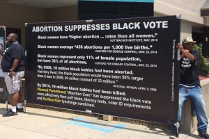 A coalition of African American men and women from around the U.S. stood outside the NAACP Convention in Cincinnati July 19 to protest the organization's support for abortion. (CT Photo/John Stegeman)