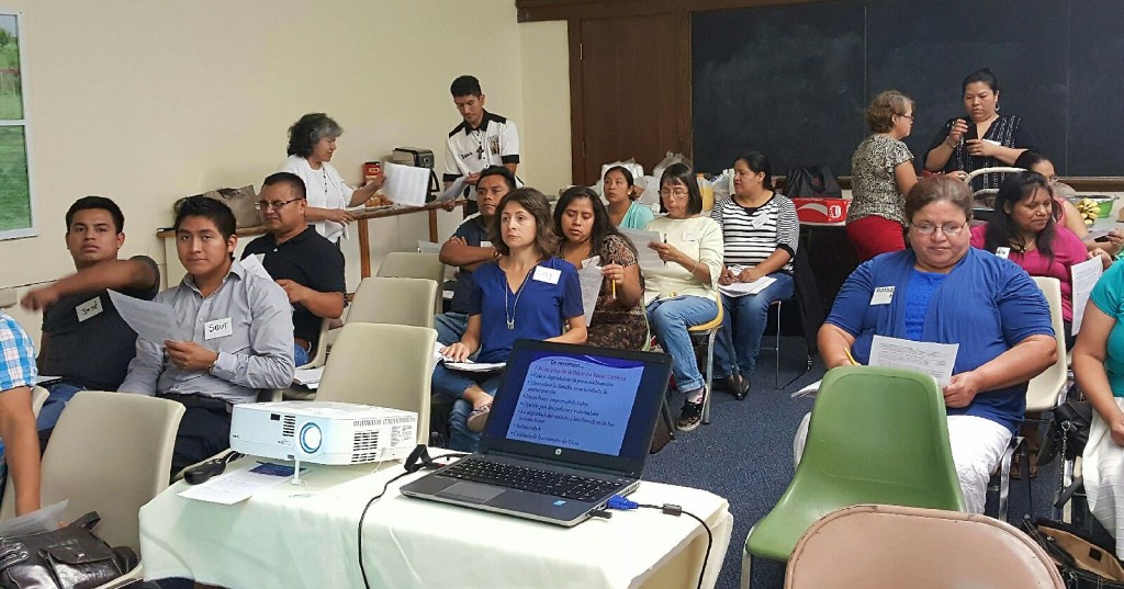 Hispanic adults students are shown attending a Catholic Social Teaching formation program recently. (Courtesy Photo)