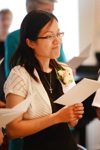 Sister of Mercy Phuong Mai Dong smiles during her first profession ceremony. (Courtesy Photo)