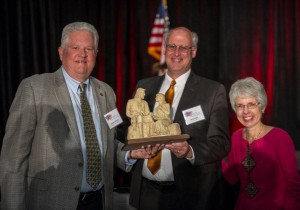 Joseph Brinck II, Right to Life of Greater Cincinnati Board President Jack Hart, and Executive Director Paula Westwood with the Life Award statue. (Courtesy Photo)