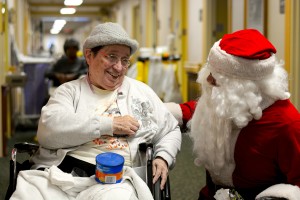 Sister Marjorie Huelsman is all smiles during a visit with Santa at the Maria Joseph Center in Dayton. (Courtesy Photo)