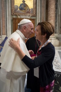 Pope Francis greets Karen Kane, director of the archdiocesan Office of Divine Worship and Sacraments. (Courtesy Photo)