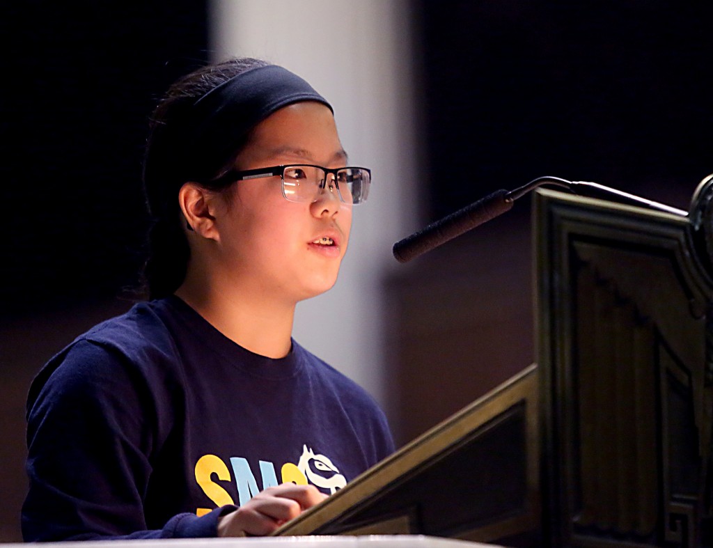 Heather Schwab, from St. Michael School in Sharonville, gives the First Reading during the Catholic Schools Week Mass at the Cathedral of Saint Peter in Chains in Cincinnati Tuesday, Jan. 31, 2017. (CT Photo/E.L. Hubbard)