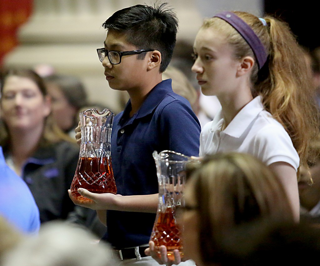 Students carry the Gifts to the Altar during the Catholic Schools Week Mass at the Cathedral of Saint Peter in Chains in Cincinnati Tuesday, Jan. 31, 2017. (CT Photo/E.L. Hubbard)