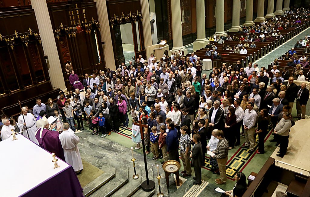 Auxiliary Bishop Joseph Binzer addresses the Catechumens and their godparents during the Rite of Election of Catechumens and of the Call to Continuing Conversion of Candidates who are preparing for Confirmation and Eucharist or Reception into Full Communion with the Roman Catholic Church at the Cathedral of St. Peter in Chains in Cincinnati Sunday, Mar. 5, 2017. (CT PHOTO/E.L. HUBBARD)