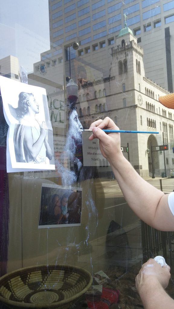 On Holy Saturday, Michael Glass begins his artwork on the Risen Christ. (Greg Hartman/CT Photo)