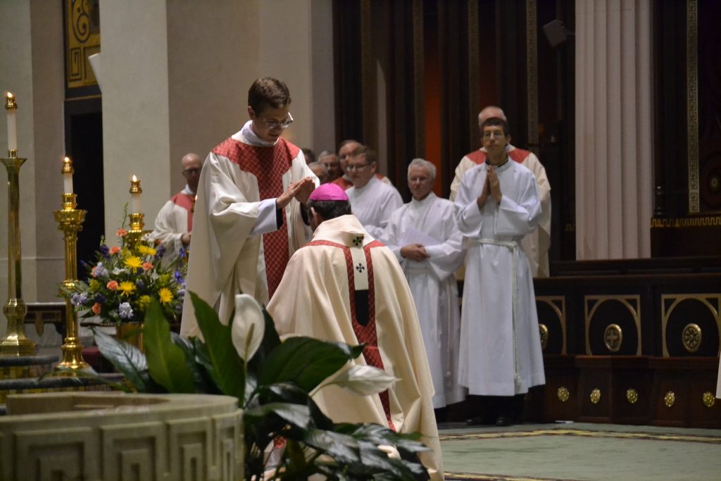 Reverend Langenkamp prays for Archbishop Dennis Schnurr (CT Photo/Greg Hartman)