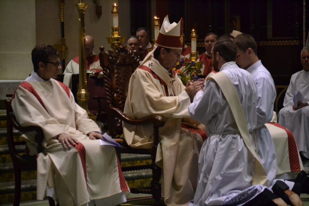 The Archbishop questions AlexanderWitt about his intention to serve the people of God and perform their ministry as ordained priests (CT Photo/Greg Hartman)