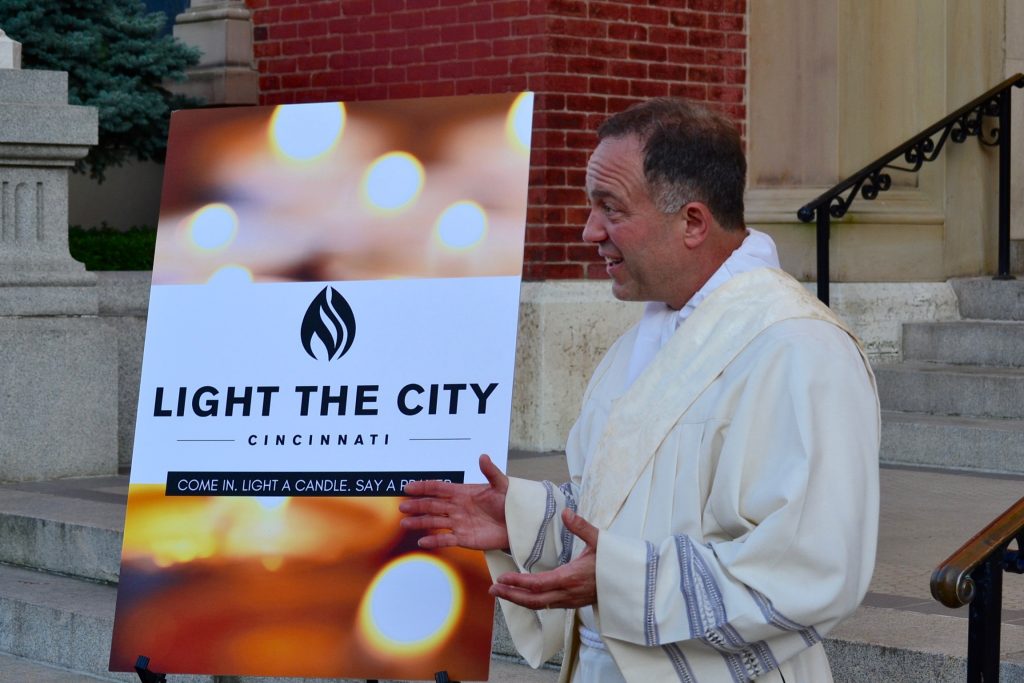 The night involved walking in city neighborhoods, an invitation to prayer, and an invitation inside the church. (CT Photo/Greg Hartman)