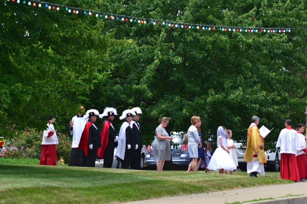 The Corpus Christi procession begins at Guardian Angels Parish. (CT Photo/Greg Hartman)