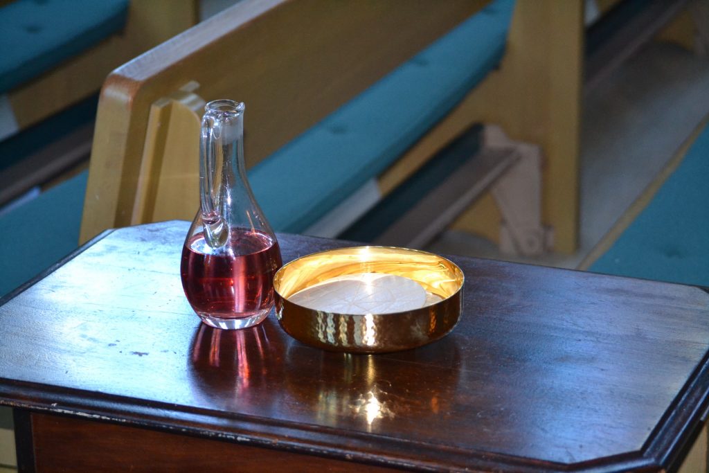 A quiet moment before Mass (CT Photo/Greg Hartman)