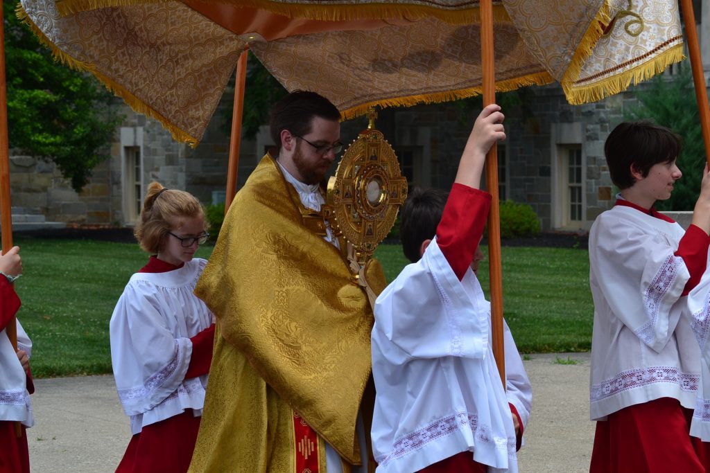 Fr. Alexander Witt arrives at the foot of the steps at the Athenauem of Ohio. (CT Photo/Greg Hartman