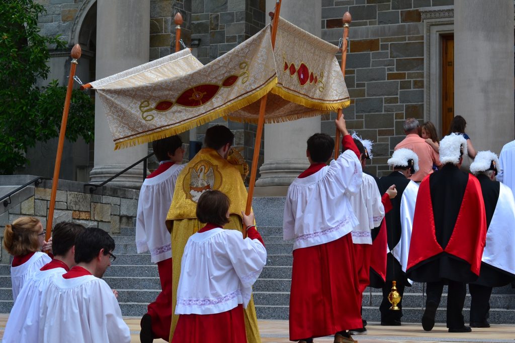 The Blessed Sacrament reaches the entrance of The Athenauem of Ohio (CT Photo/Greg Hartman)