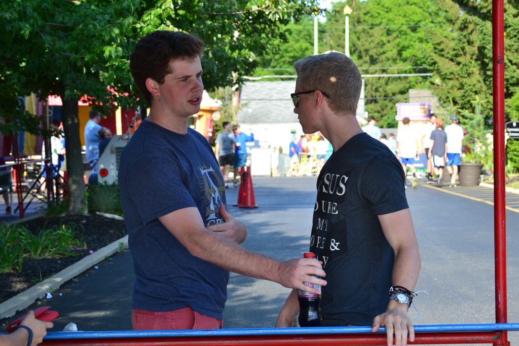 Discussion at the Truth Booth ensues. (CT Photo/Greg Hartman)