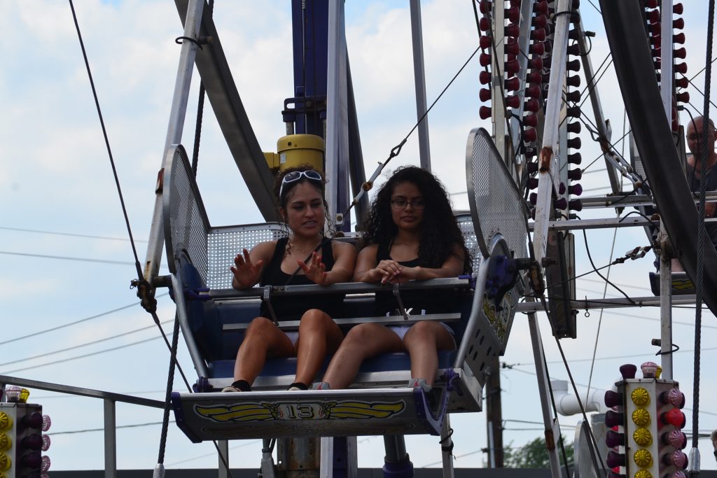 Awaiting to ride the Ferris Wheel (CT Photo/Greg Hartman)