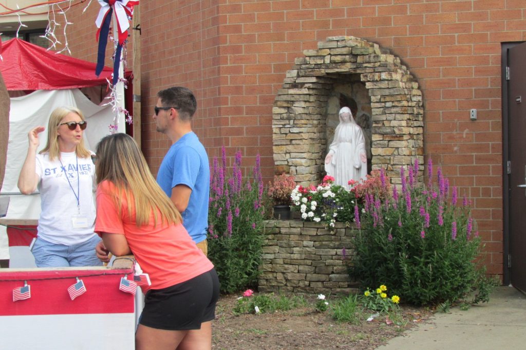 Visitors enjoying a day at the festival and a Mary Garden! (CT Photo/Greg Hartman)