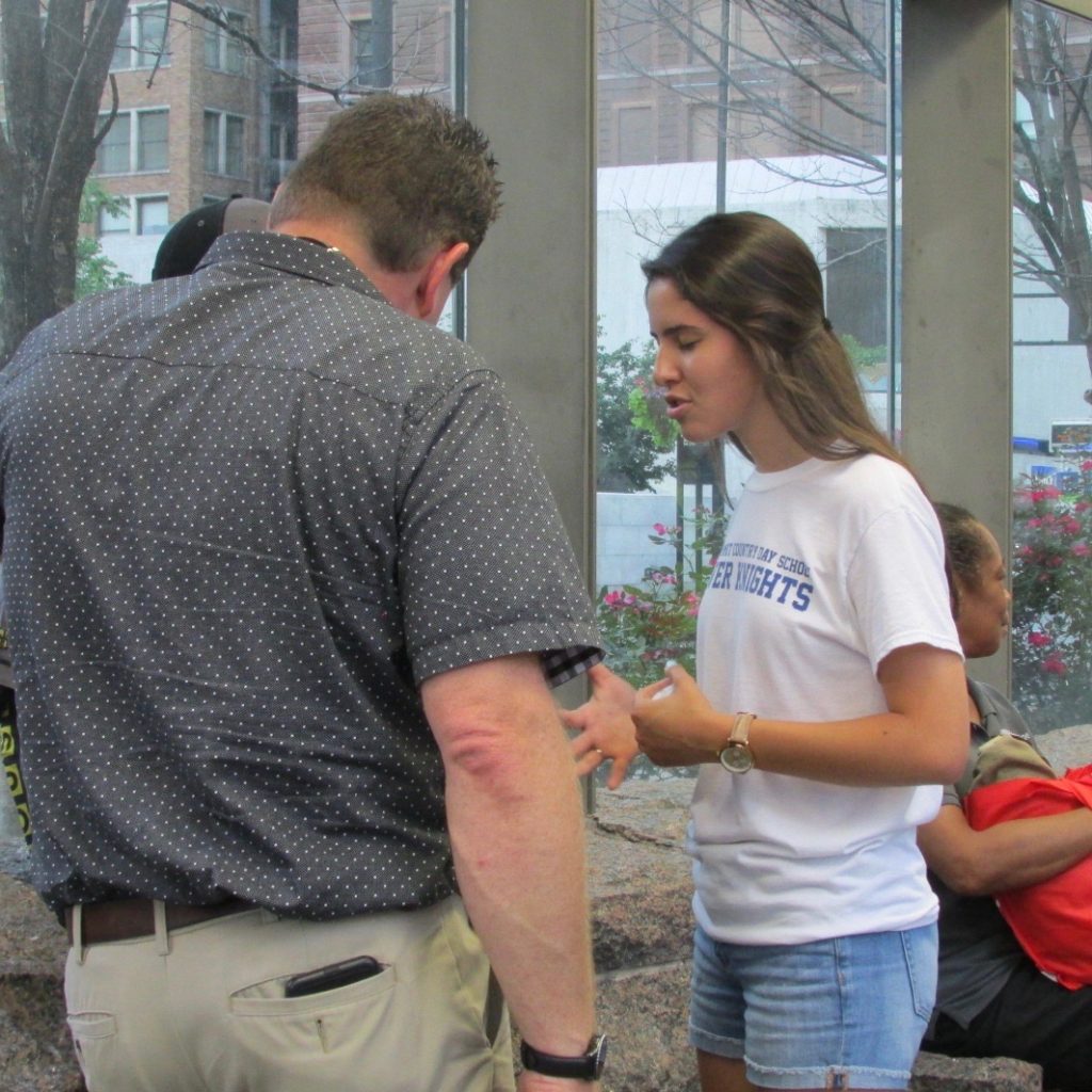 Praying with your neighbor (CT Photo/Gail Finke)