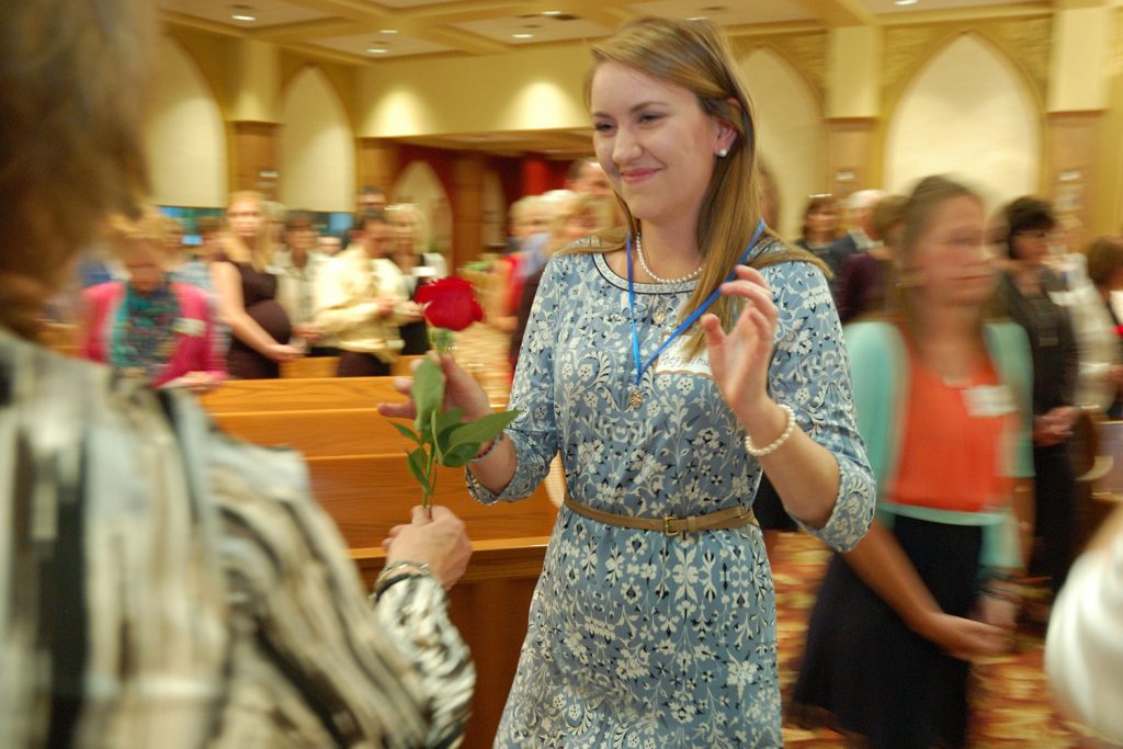 Colleen Poeppelman received her medal and rose. She is from St. Michael’s, Ft. Loramie, Ohio (CT Photo/Jeff Unroe)