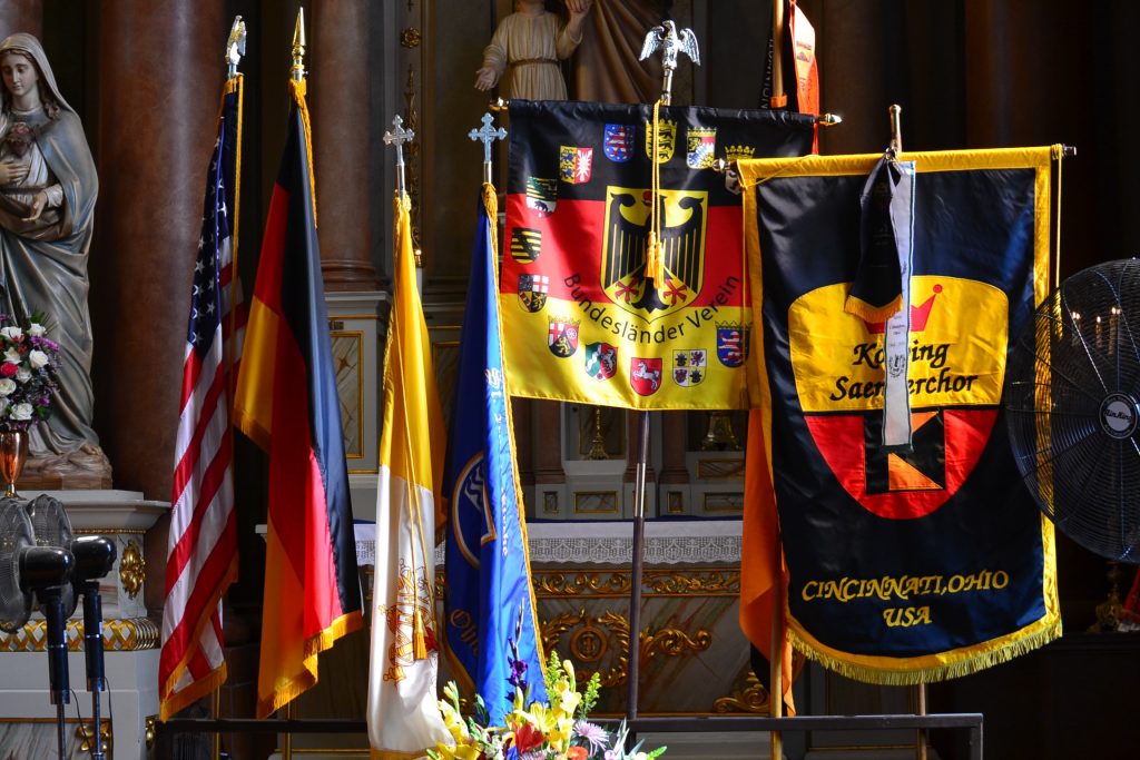 The American Flag, Vatican Flag and German Society Flags for the 175th Anniversary Mass. (CT Photo/Greg Hartman)