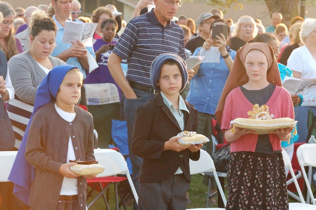 Children portraying the three Fatima children are: Ava Timmeman (8, from Fort Recovery), Kadyn Alter (10, from Celina), and Christine Merrill (12, from Fort Recovery). (CT Photo/Jeff Unroe)