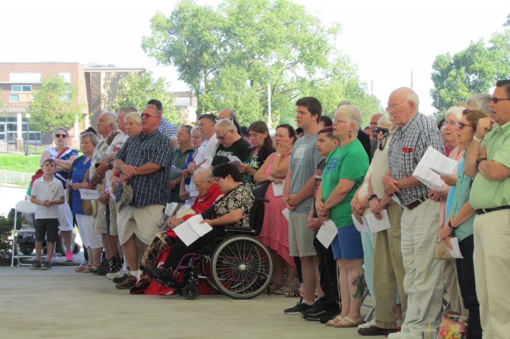 Hundreds of people pray at the Irish Mass at the Dayton Celtic Festival (CT Photo/Gail Finke)