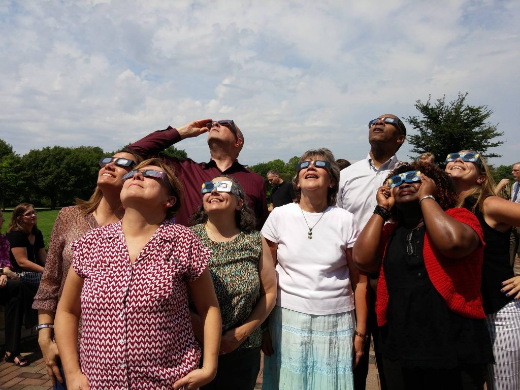 The partial eclipse of the sun is viewed at the University of Dayton)
