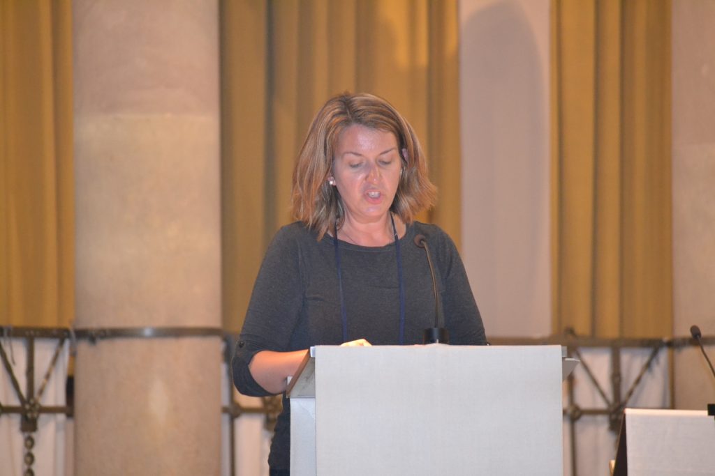 Sara Patterson lectors at the first Mass in Spain for Pilgrims at a local parish, Guardian Angels (CT Photo/Greg Hartman)