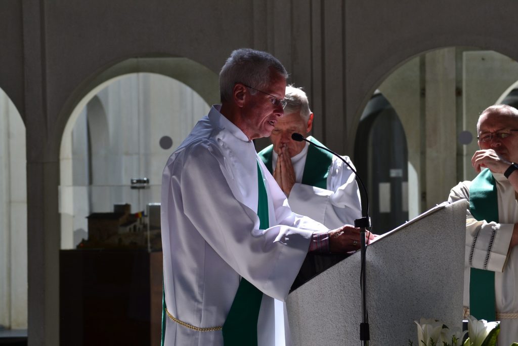 Deacon Tim reads the Gospel at Mass at Our Lady of Mertixell in Andorra (CT Photo/Greg Hartman)