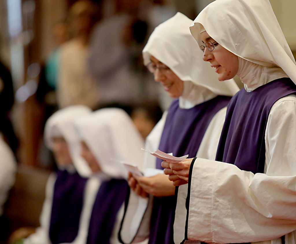 Sr. Antonetta Maria and Sr. Mary Consolata recite their intentions for the Ceremony of First Profession during the Feast of the Presentation of Mary at Our Lady of the Holy Spirit Center in Norwood Tuesday, Nov. 21, 2017. (CT Photo/E.L. Hubbard)