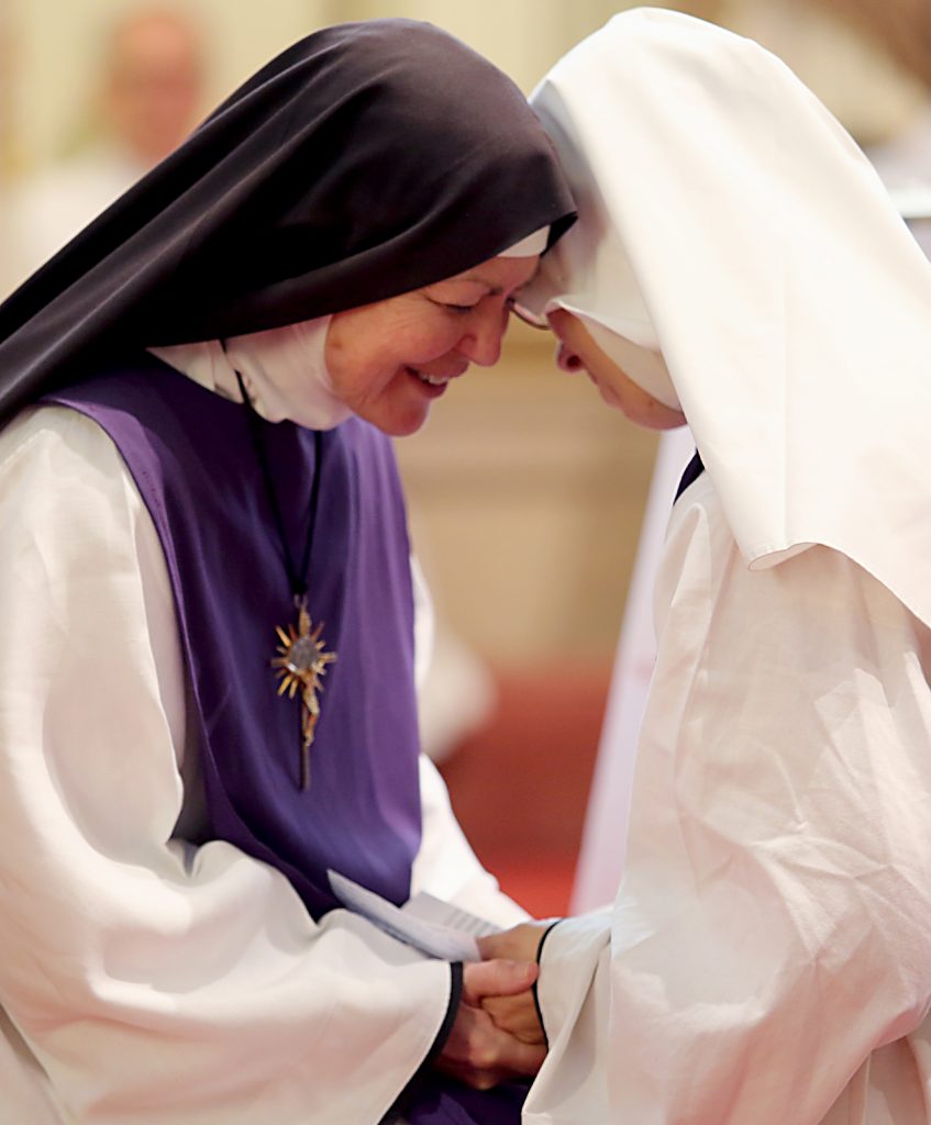 Mother Margaret Mary listens to Sr. Antonetta Maria profess her vows for the Ceremony of First Profession during the Feast of the Presentation of Mary at Our Lady of the Holy Spirit Center in Norwood Tuesday, Nov. 21, 2017. (CT Photo/E.L. Hubbard)