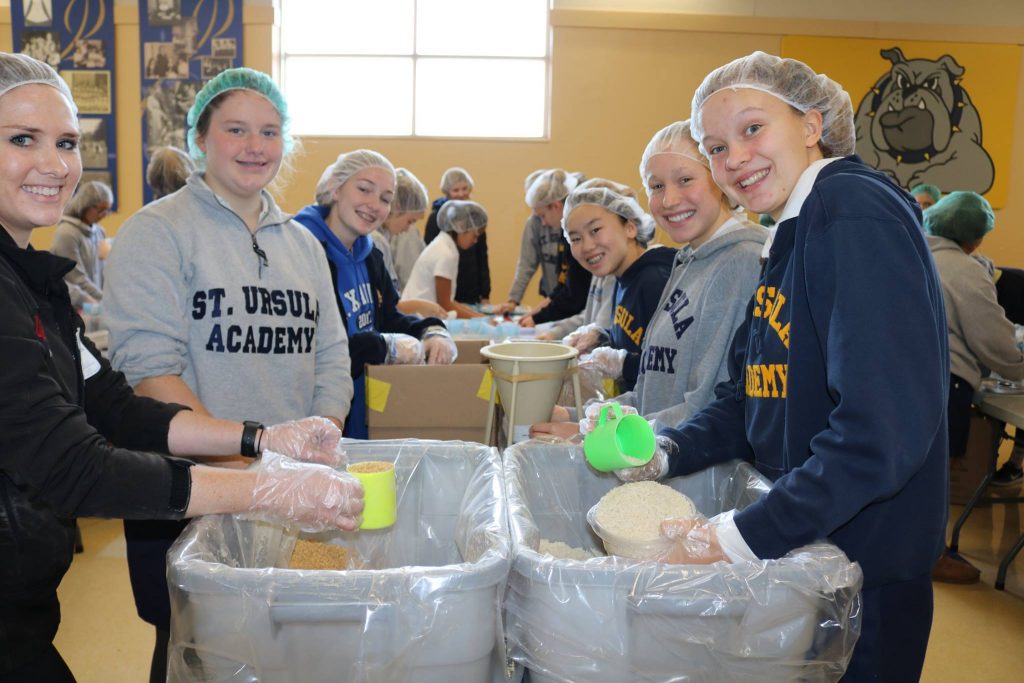 St. Ursula Academy prepares food for people in Africa.