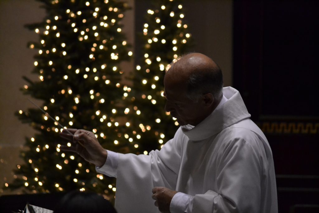 Anthony DiCello, Cathedral Music Director, conducts The Choir of St. Peter in Chains Cathedral (CT Photo/Greg Hartman)