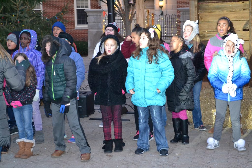 Festive carols sung awaiting the lighting of the Christmas Tree (CT Photo/Greg Hartman)