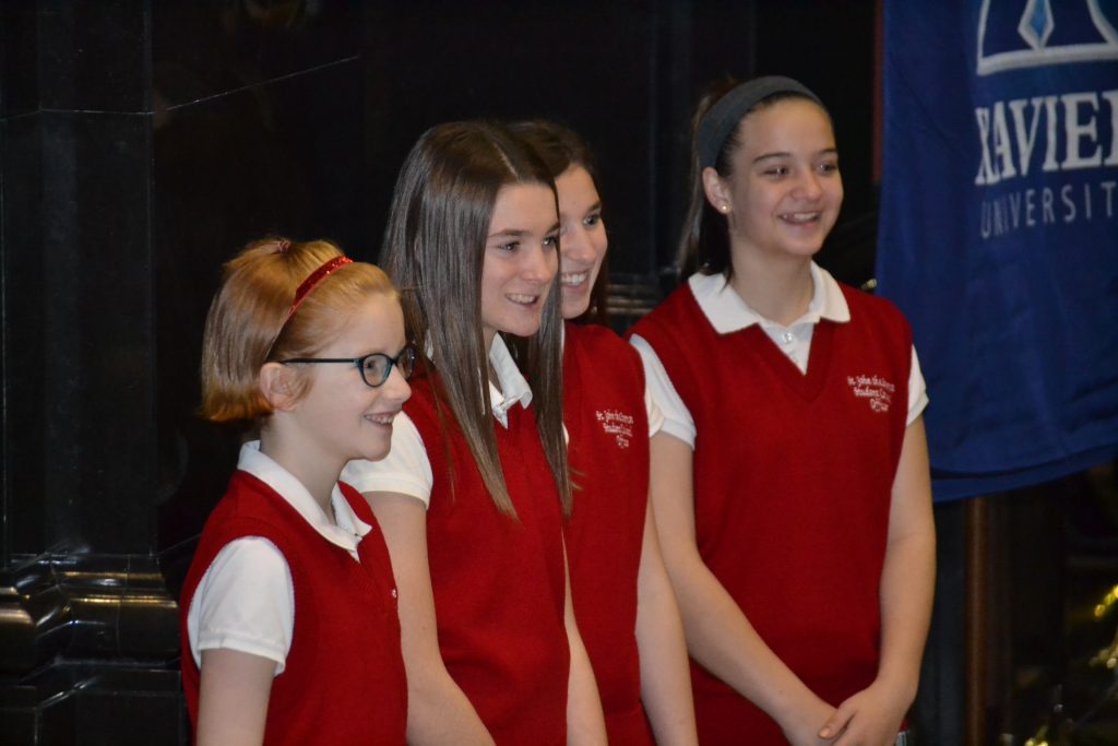 Students from St. James the Greater awaiting the Catholic Schools Week Mass. (CT Photo/Greg Hartman)